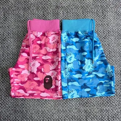 BP Flame-print camouflage shorts