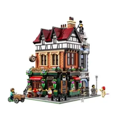 British-style street corner building block toy compatible with the LEGO Modular Buildings series.